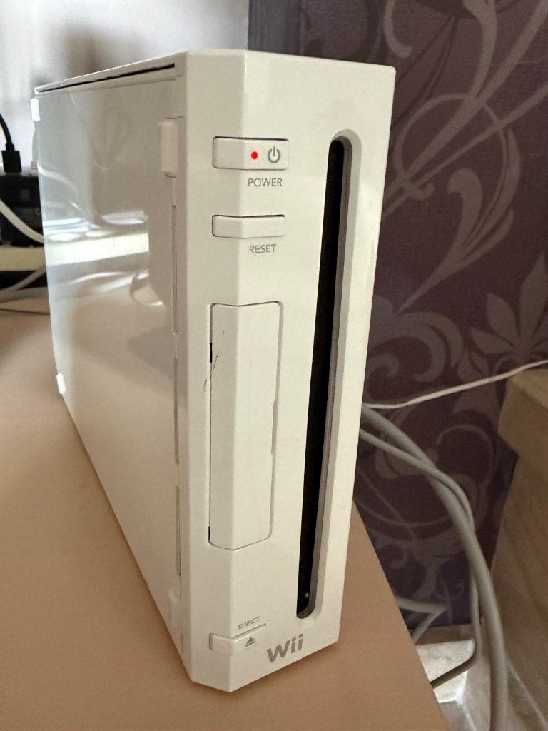 WII, Ophalen, Zo goed als nieuw, Met 2 controllers, Met games