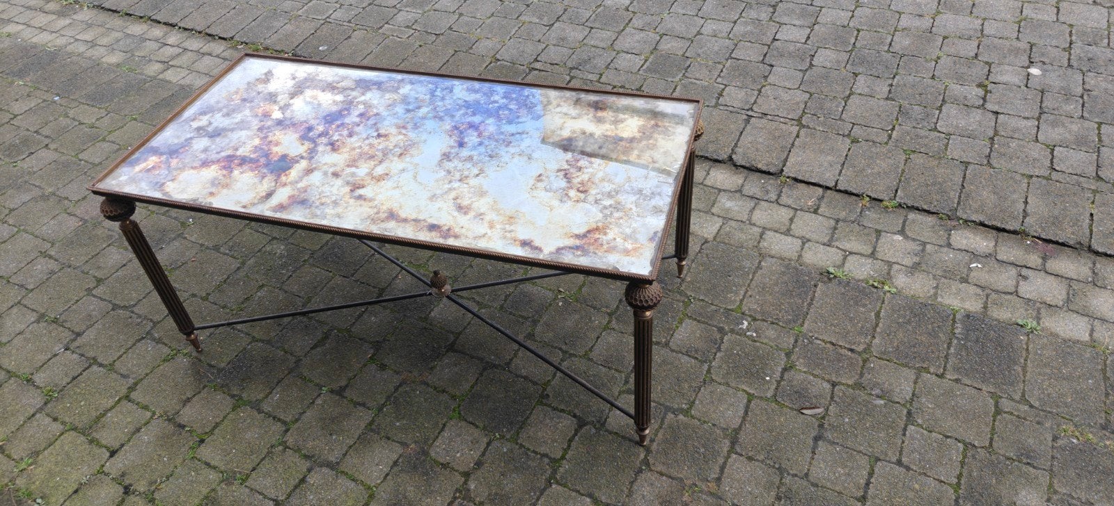salontafel met spiegelglas, Ophalen