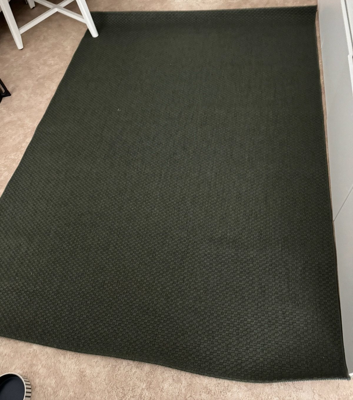 Tapis neuf, Enlèvement