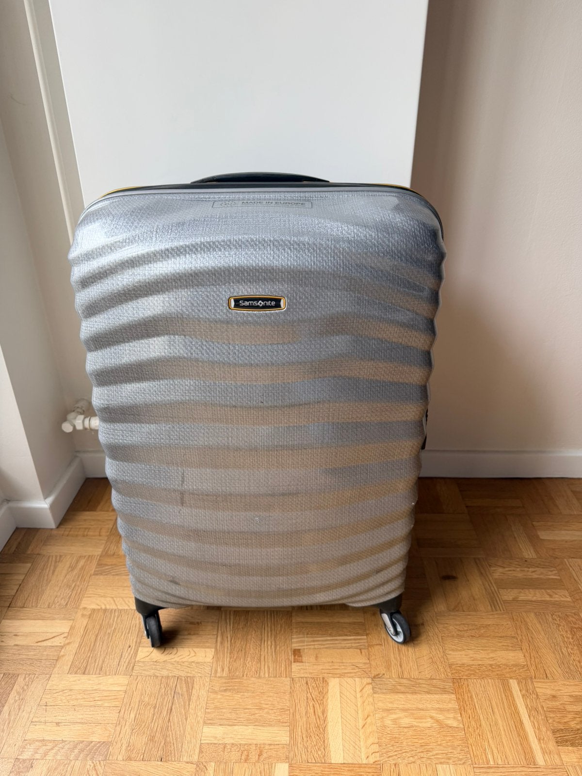 Spinner Samsonite Lite-Shock 69 cm, Bijoux, Sacs & Beauté, Valises, Enlèvement ou Envoi, Comme neuf