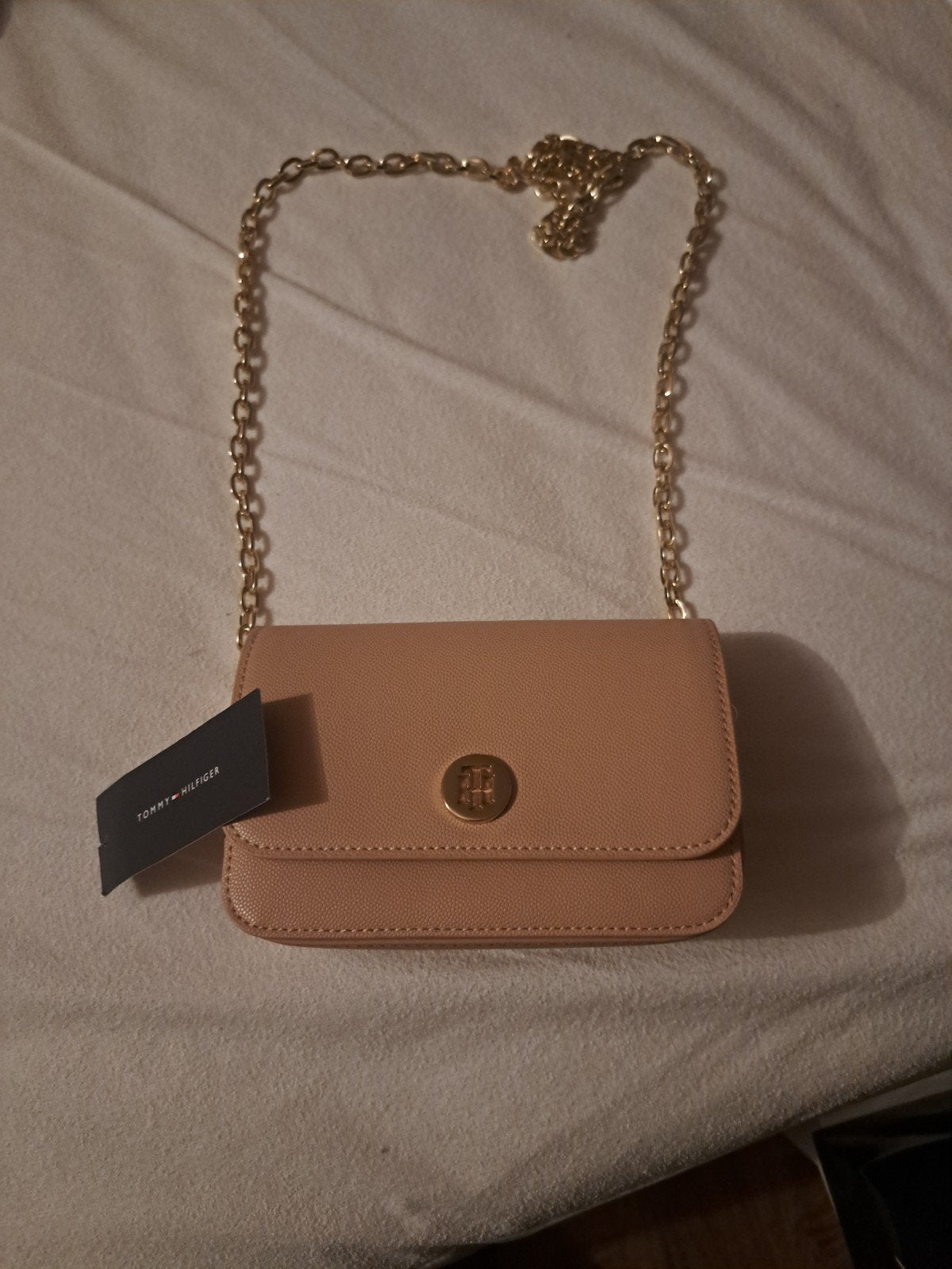 Handtasje tommy, Ophalen, Roze