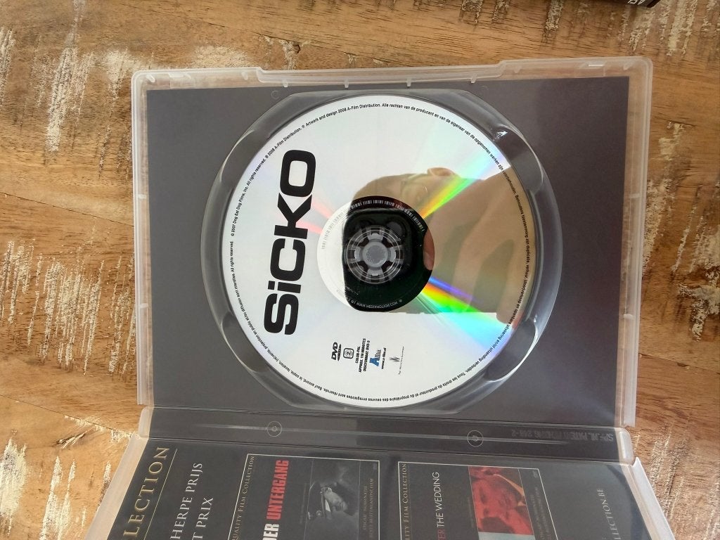 2 DVD's Michael Moore: Sicko / Fahrenheit 9/11, Vanaf 12 jaar, Ophalen of Verzenden, Zo goed als nieuw, Politiek of Geschiedenis