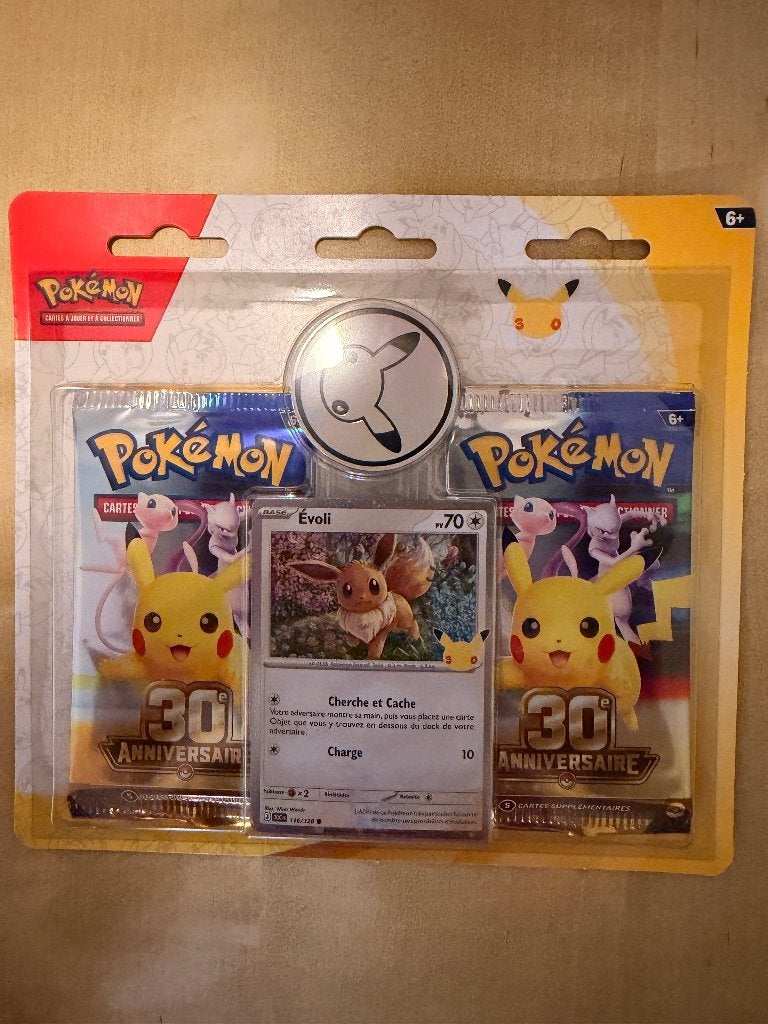 Pokémon 30e Anniversaire - duo pack Évoli FR, 2 boosters, Enlèvement ou Envoi, Neuf, Autres types