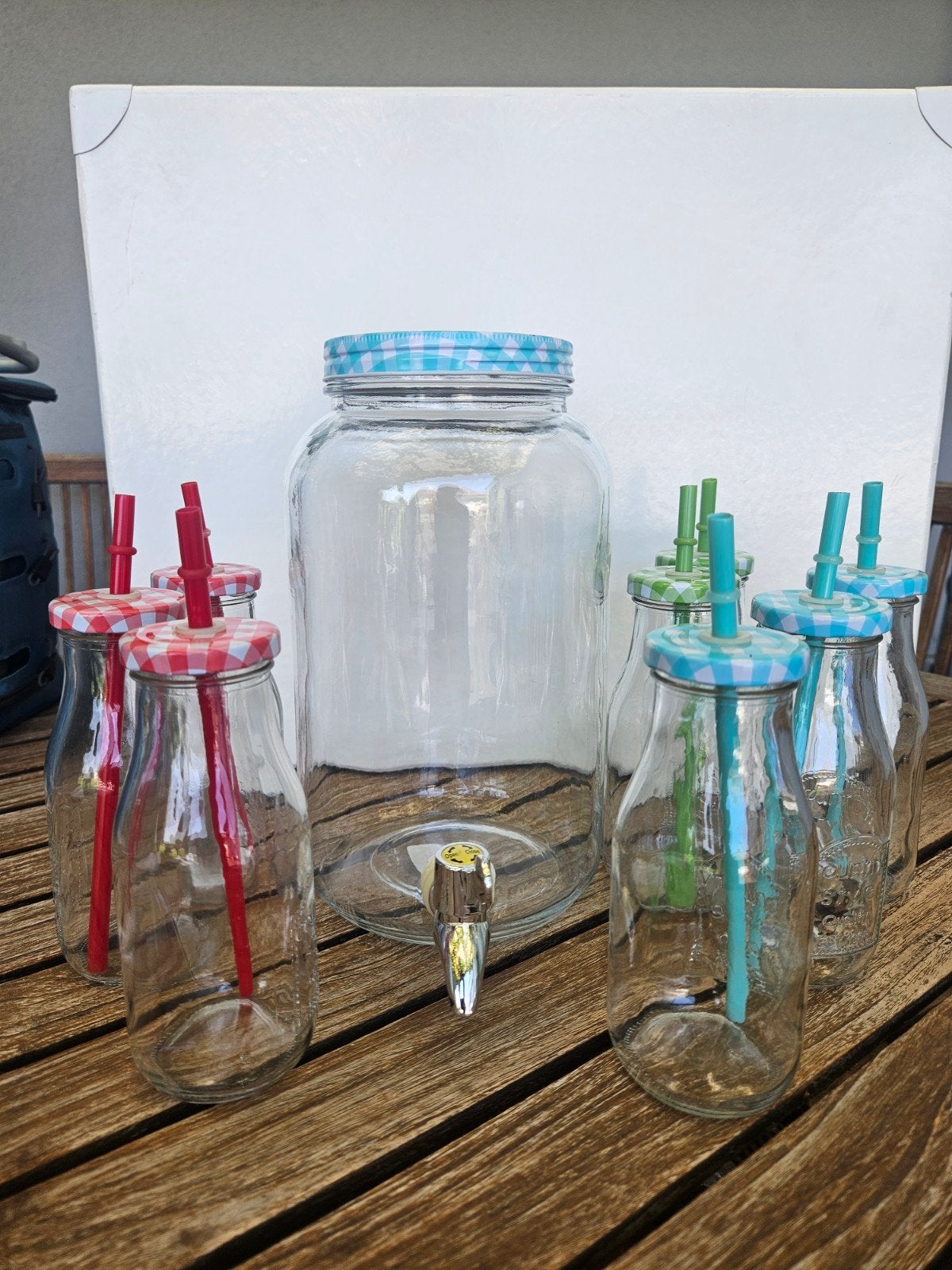 Drankdispencer met flesjes, Ophalen