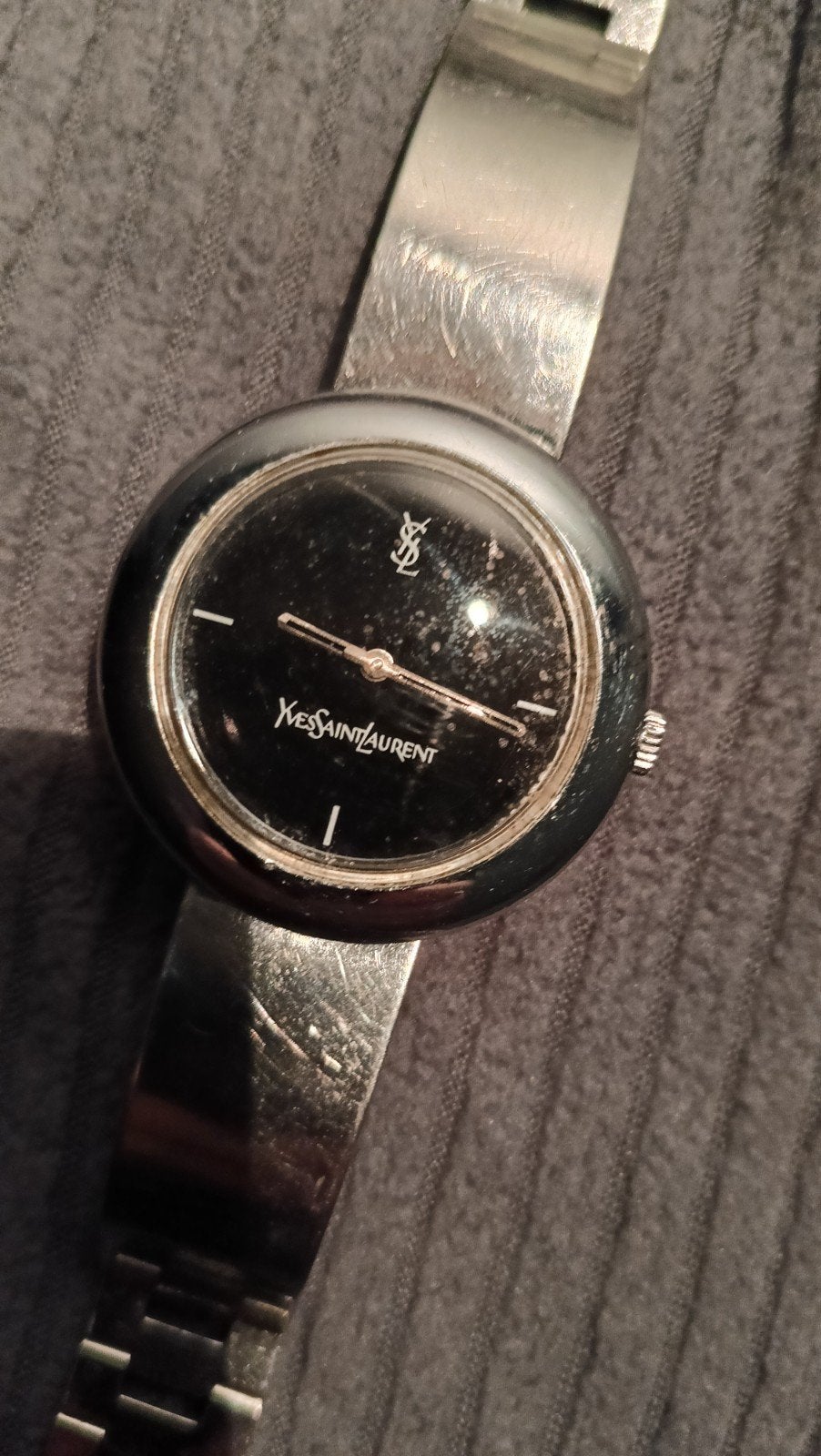 magnifique montre vintage à remontage Yves Saint Laurent pou, Montre-bracelet, Autres marques, Enlèvement ou Envoi, Acier