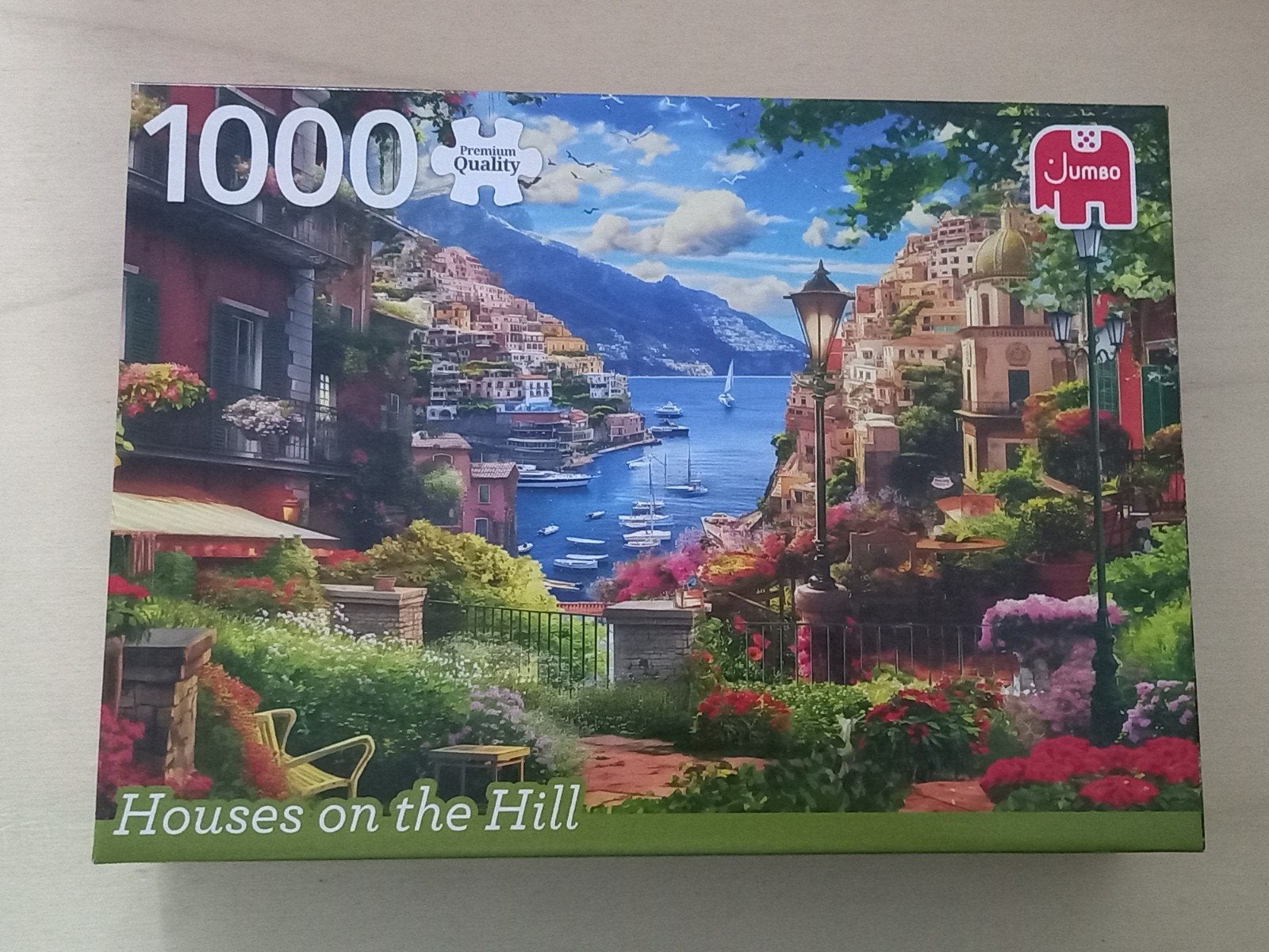 Puzzle Jumbo de 1000 pièces - Maisons sur la colline, Enlèvement ou Envoi, 500 à 1500 pièces, Utilisé, Puzzle