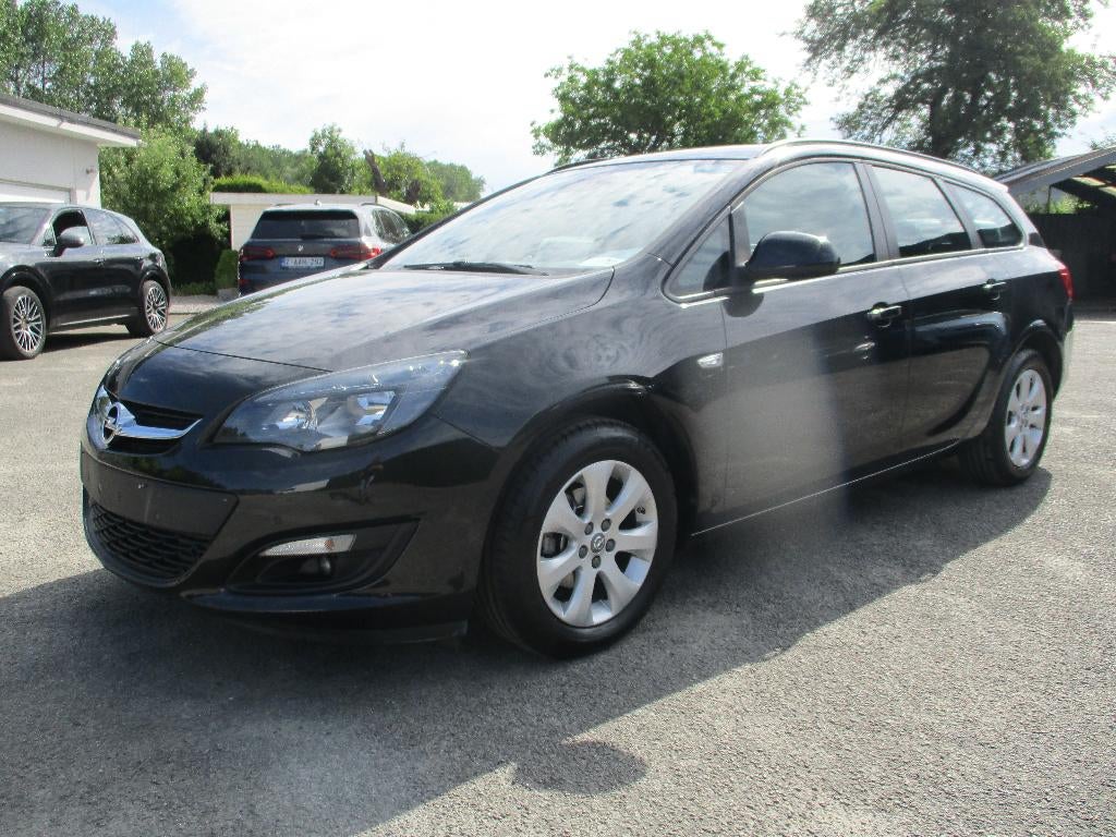 Opel Astra 1.4i Sports Tourer/Airco/Media/Garantie/69.000km, Voorwielaandrijving, 4 cilinders, Leder en Stof, Zwart