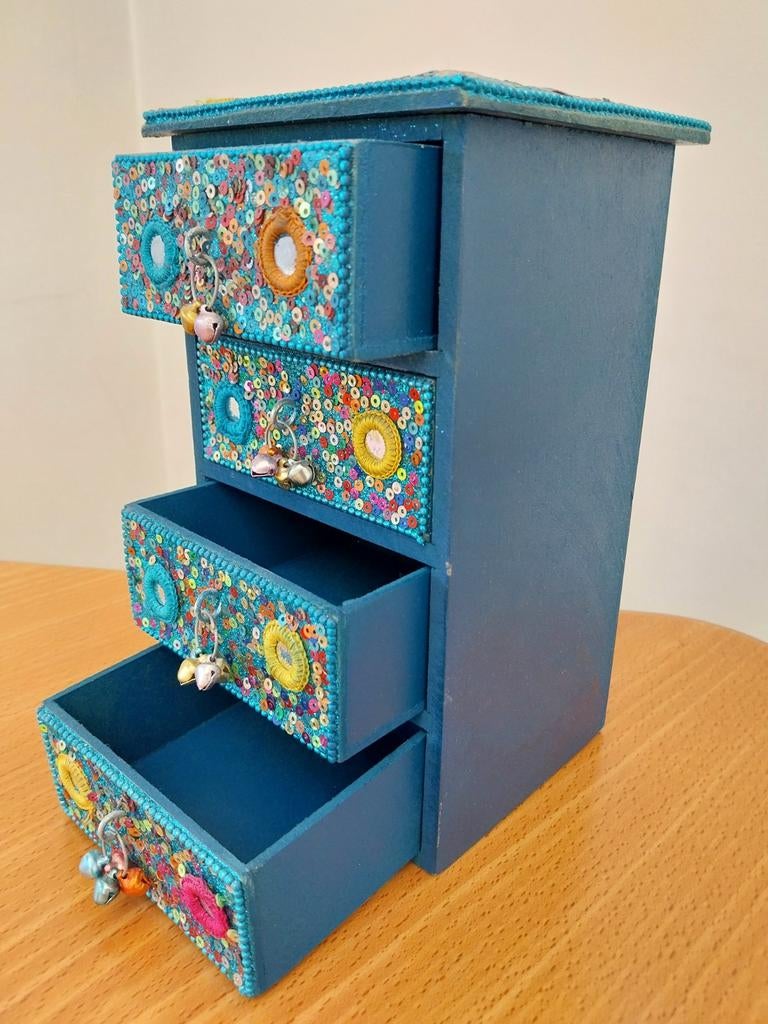 Juwelenkistje blauw, Ophalen