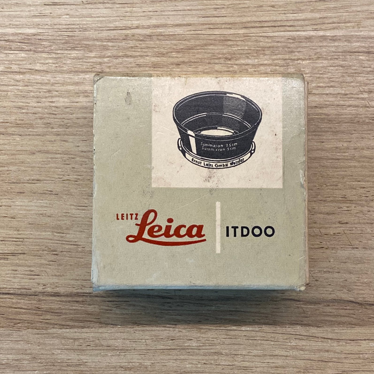 Leica Leitz Wetzlar ITDOO, pare-soleil *neuf, en boîte, Enlèvement ou Envoi, Neuf, Leica