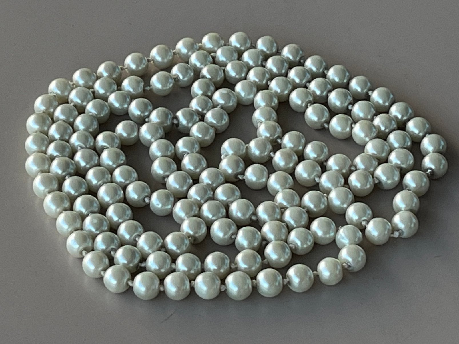 Lange vintage glasparelketting, Hobby en Vrije tijd, Ophalen of Verzenden, Gebruikt, Kraal
