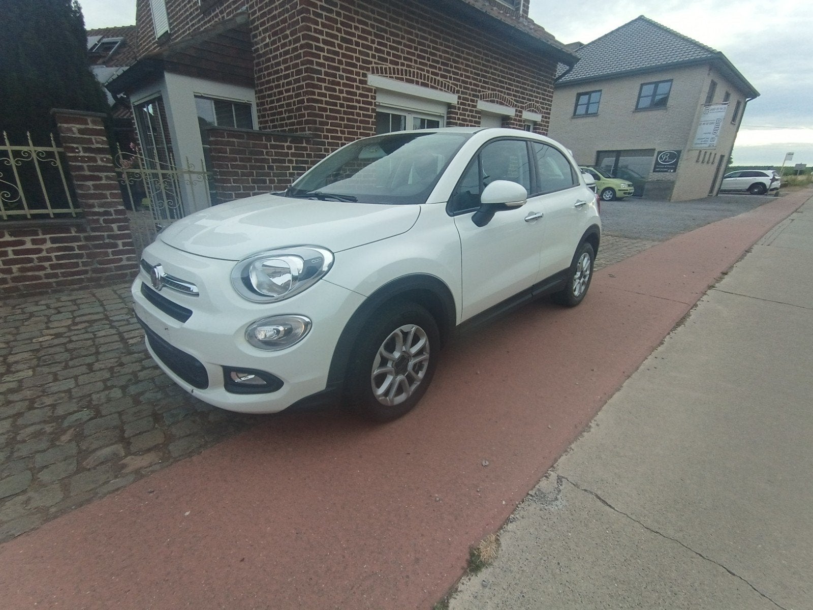 Fiat 500X / slechts 50600km / gekeurd + garantie, Euro 5, Stof, Navigatiesysteem, Zwart