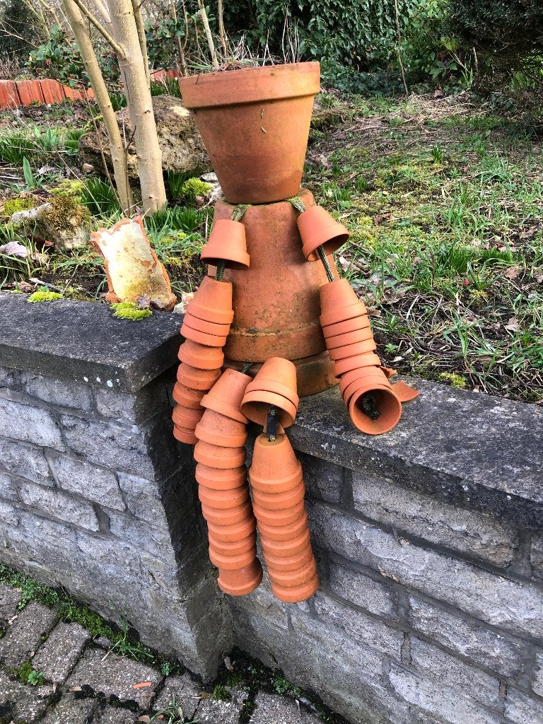 Mannetje in bloempotten, Ophalen, Gebruikt