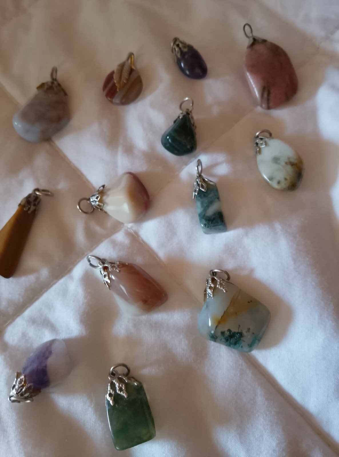 zilveren hangers met halfedelstenen, Ophalen