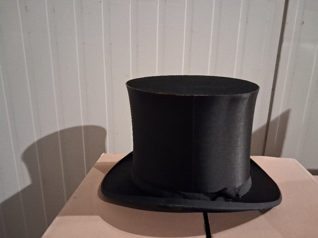 chapeau haut de forme, Enlèvement