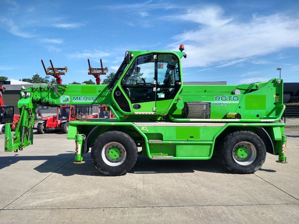 Roterende verreiker Merlo Roto 60.24 MCSS (016), Enlèvement, Utilisé