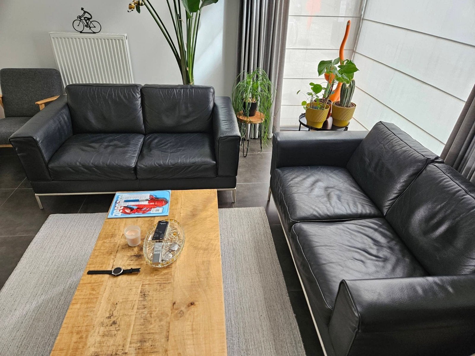 zwart leder salon, Enlèvement