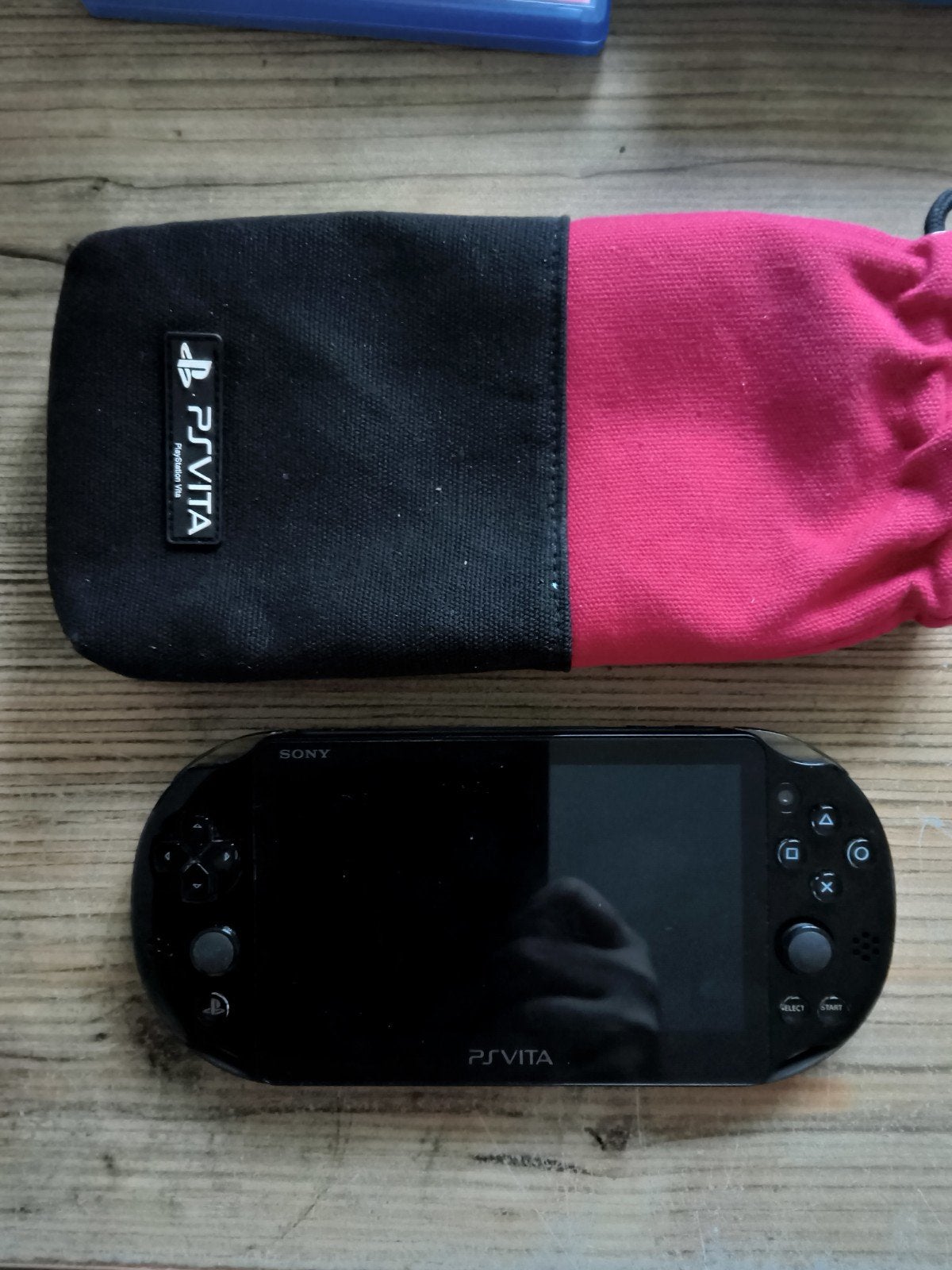PS Vita met oplader en stoffen hoesje, Verzenden, Zo goed als nieuw, Zwart