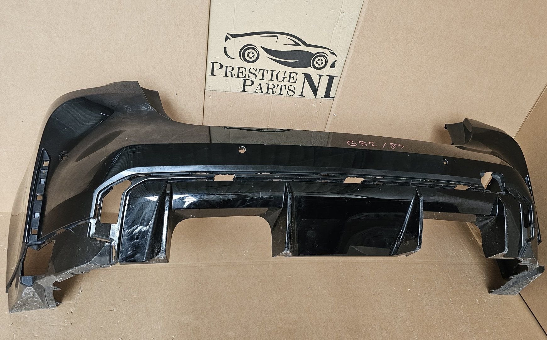 Achterbumper BMW 4 Serie M4 G83 G82 ORIGINEEL 51128074696, Auto-onderdelen, Carrosserie, Bumper, BMW, Achter, Gebruikt, Herkomst onderdeel bekend