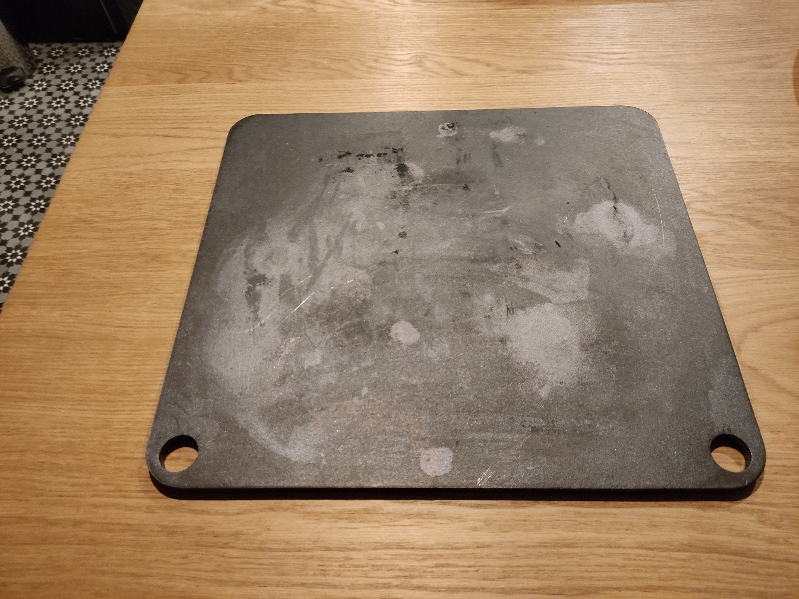 Stalen pizzaplaat, Ophalen