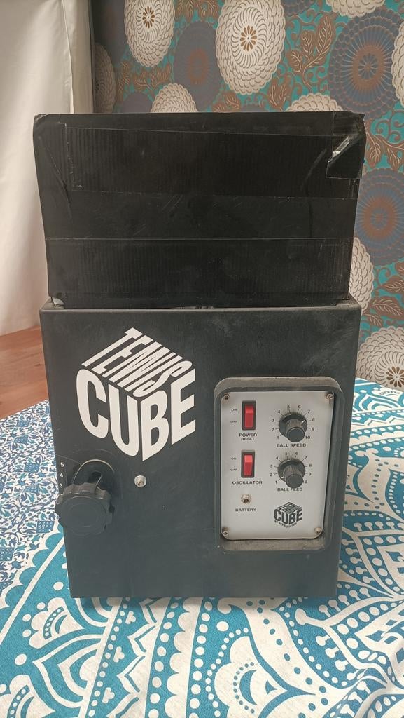 Tennis cube, Ophalen