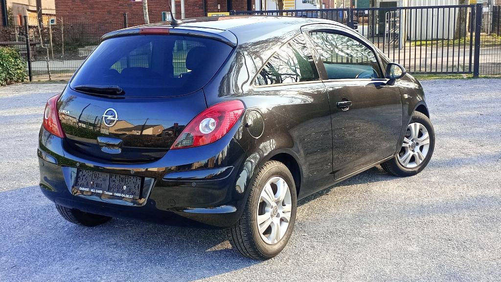 Opel corsa 1.2 benzine met vele opties., Auto's, Voorwielaandrijving, 129 g/km, 4 cilinders, Leder en Stof