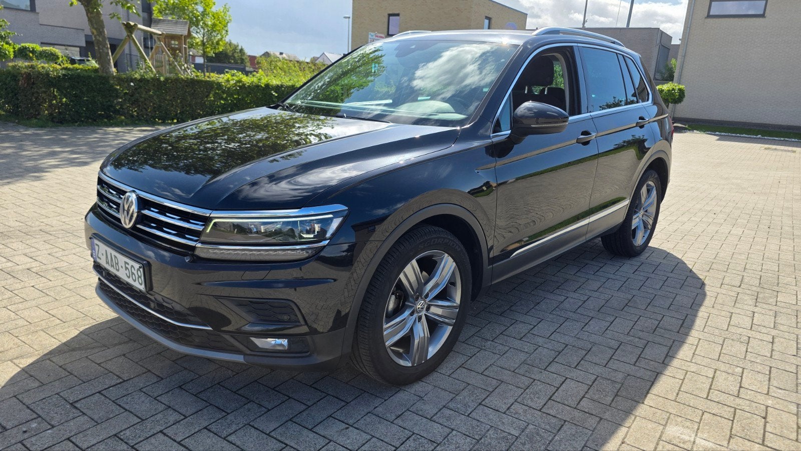 VW Tiguan 1.4 Benzine Automaat  !!, Auto's, 4 cilinders, Zwart, Leder, Parkeerassistent