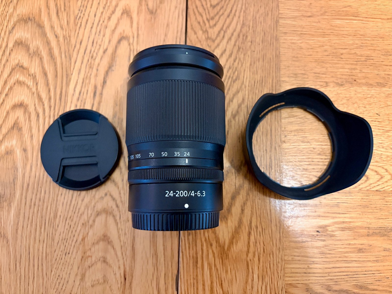Objectif Nikon Z 24-200mm, TV, Hi-fi & Vidéo, Photo | Lentilles & Objectifs, Enlèvement ou Envoi, Comme neuf, Nikon, Pare-soleil