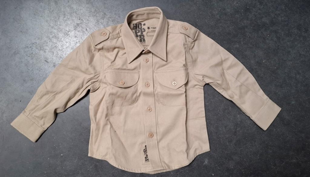 Scoutshemd babymaat geboortecadeau, Enlèvement