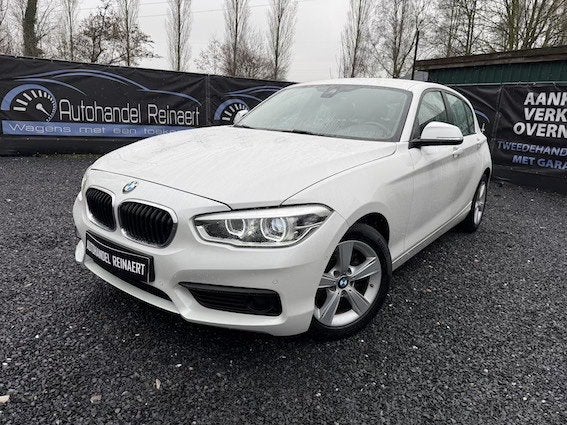 BMW 118i, 2018, 104.000km, Airco, Automaat + 12m Garantie, Automaat, Zwart, Zwart, https://public.car-pass.be/vhr/0b734e73-941e-4a69-9edb-c4691c5a5961