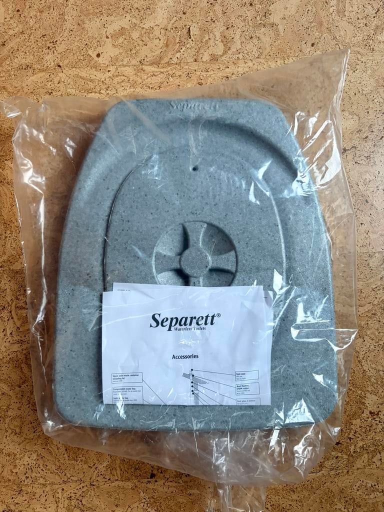 Separett toilet deksel, Ophalen