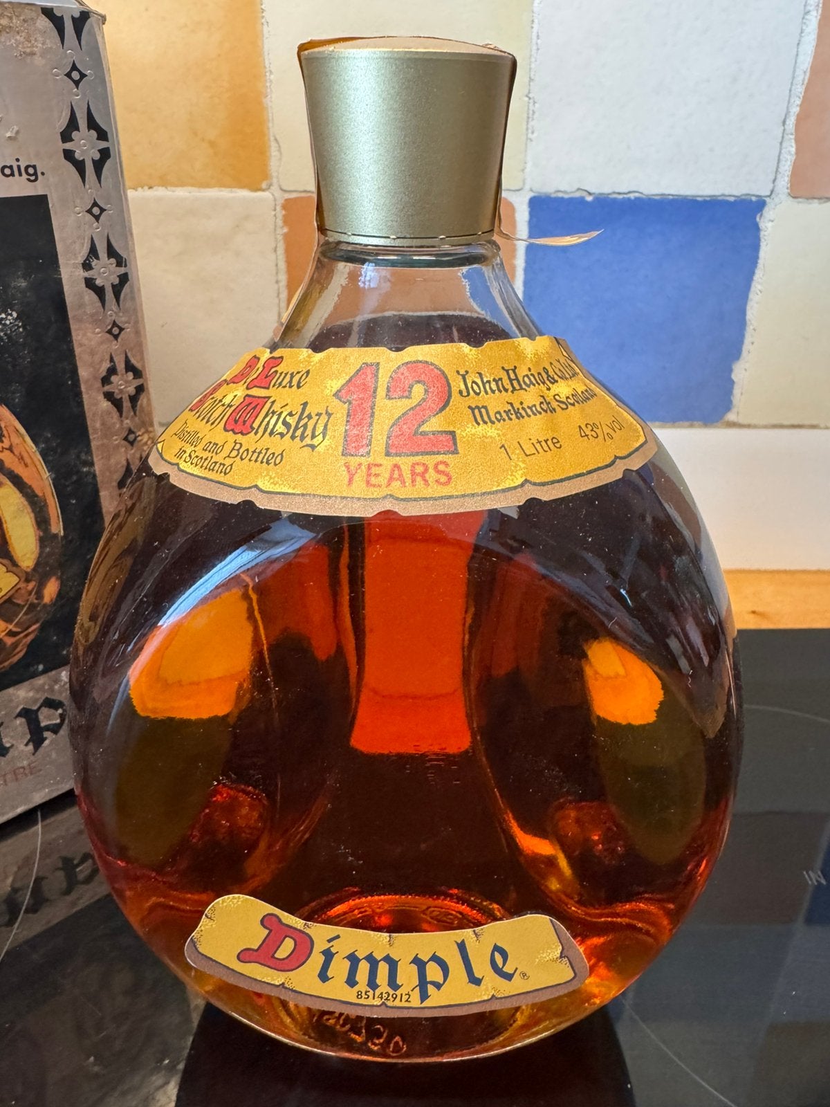 Dimple 12 Ans De Luxe Scotch Whisky ‘80 1 L43% + Boîte, Collections, Enlèvement ou Envoi, Comme neuf