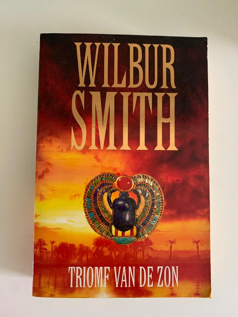 Triomf van de zon, Wilbur Smith, Boeken, Ophalen of Verzenden, Gelezen