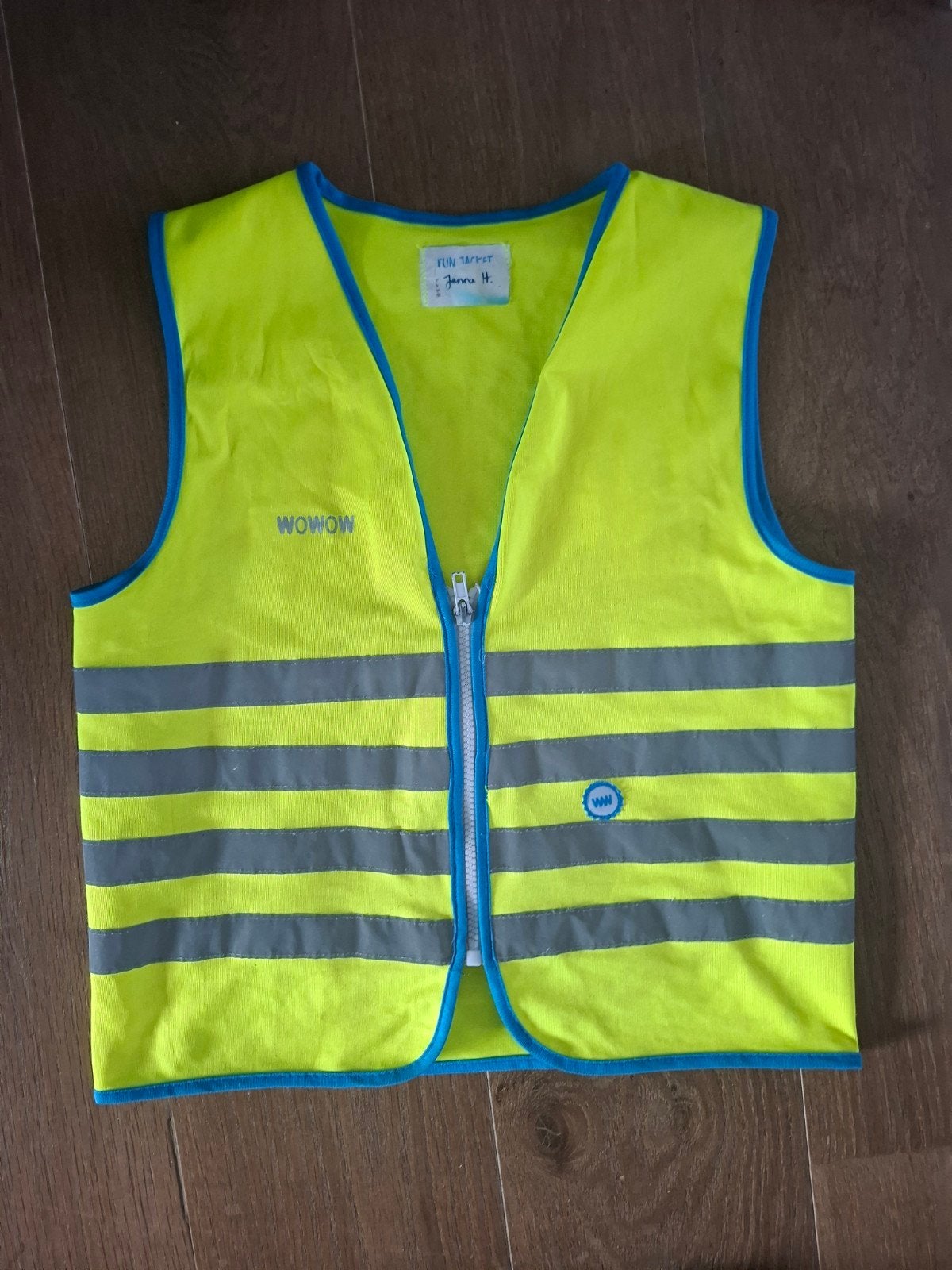 fluo hesje voor een kind, Ophalen
