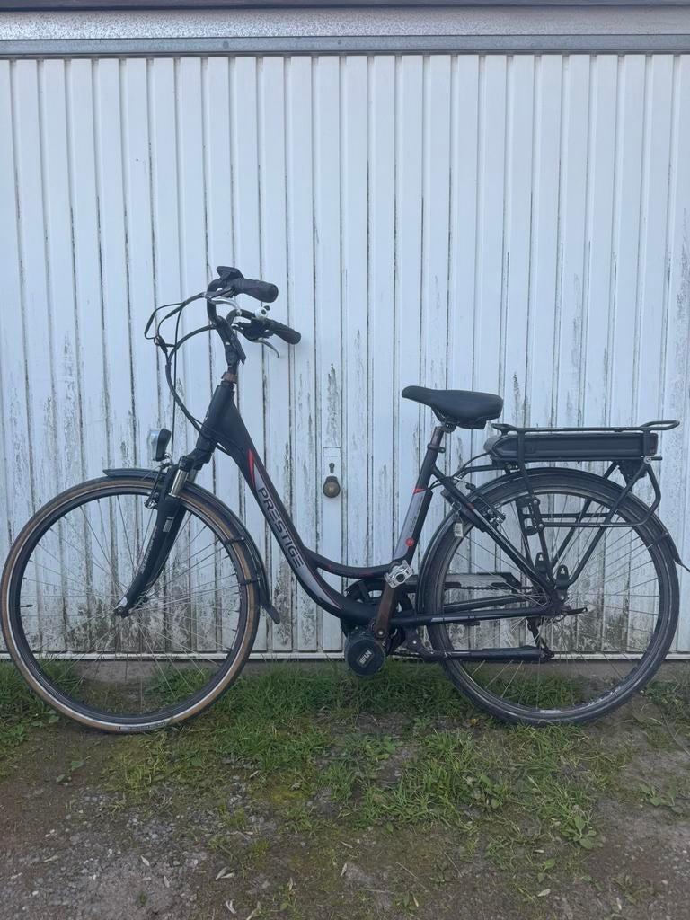 PRESTIGE ELEKTRISCHE FIETS MET MIDDENMOTOR, Ophalen, Zo goed als nieuw