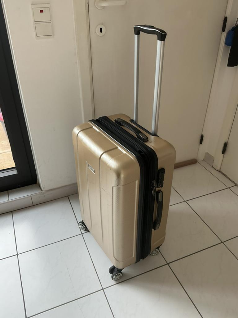 Reiskoffer, Ophalen, Zo goed als nieuw