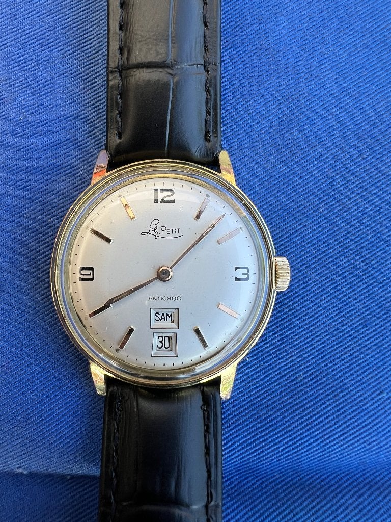 LG Petit Vintage Opwindbaar Herenhorloge, Handtassen en Accessoires, Horloges | Heren, Overige materialen, Leer, Polshorloge, Zo goed als nieuw