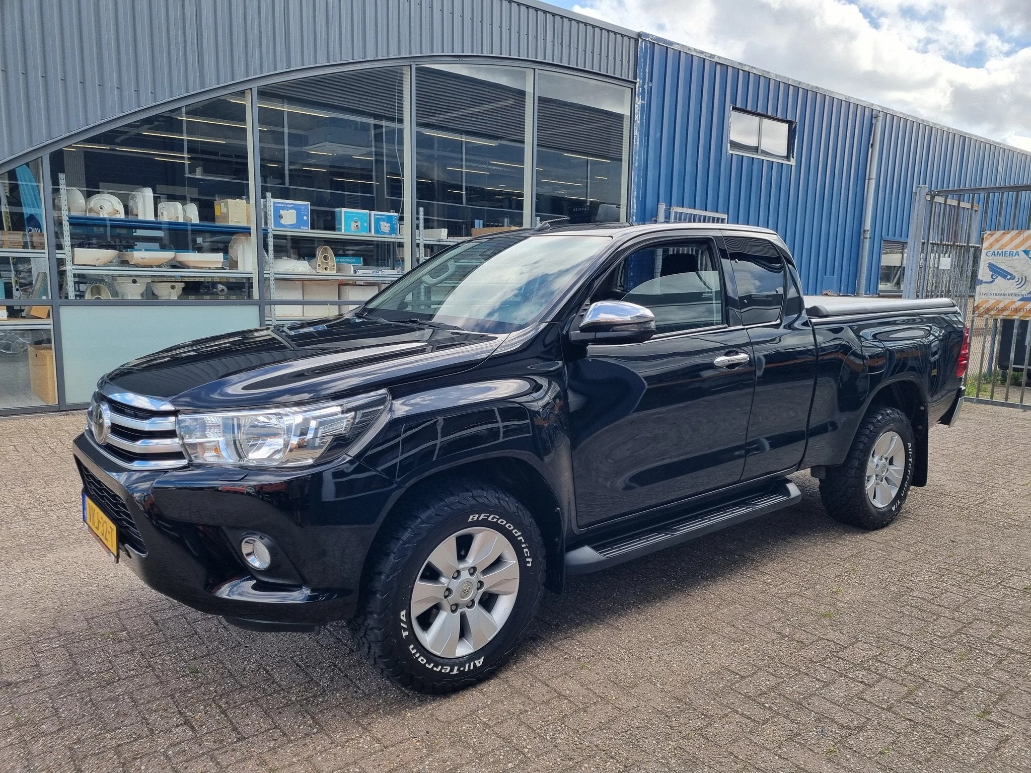 Toyota Hilux Extra Cab 4x4 2.4 D4D 150pk Euro 6 (bj 2021), Auto's, Gebruikt, 4 cilinders, Zwart, Bedrijf