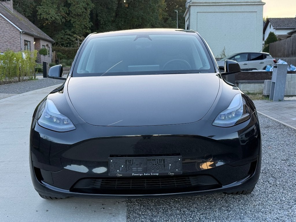 Tesla Model Y Std. Range RWD *360*Pano*Dodehoek*Keyless*ACC, Auto's, Automaat, Dealer onderhouden, Achterwielaandrijving, Zwart