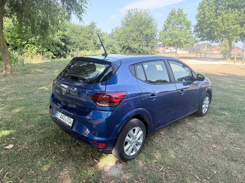 DACIA SANDERO 1,0 i Airco, Auto's, Dacia, Voorwielaandrijving, Dealer onderhouden, Stof, Blauw