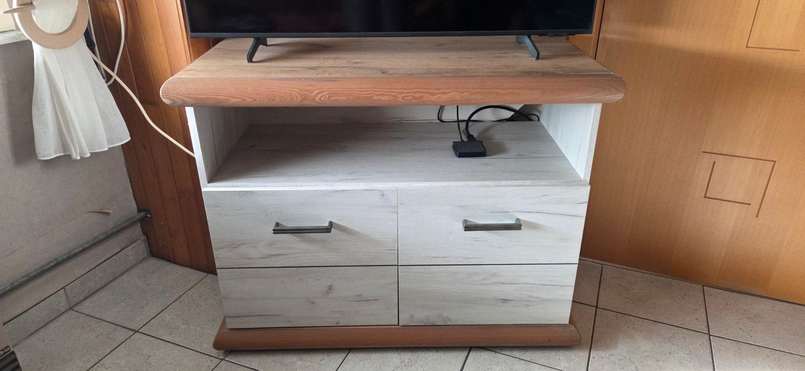 Tv kast, Ophalen