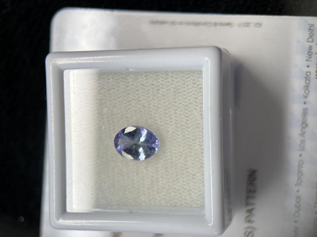 natural Blue violet tanzanite 0,98ct oval-cut (51), Enlèvement ou Envoi, Comme neuf