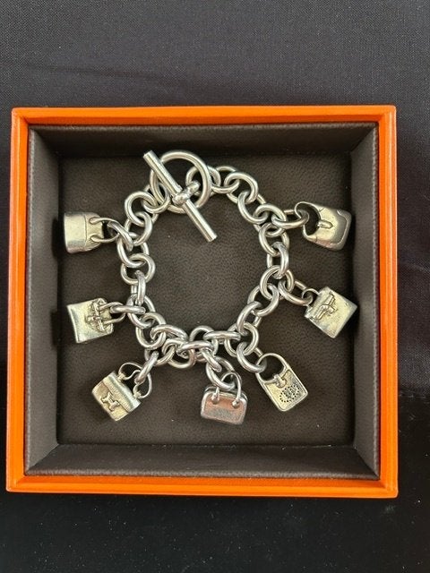 Authentieke bedelarmband Hermès 'La Ronde des Sacs' vintage, Ophalen, Gebruikt, Met bedels of kralen, Zilver