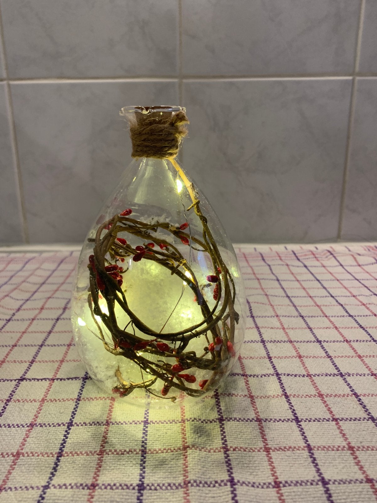 Kerstversiering lichtje, Ophalen