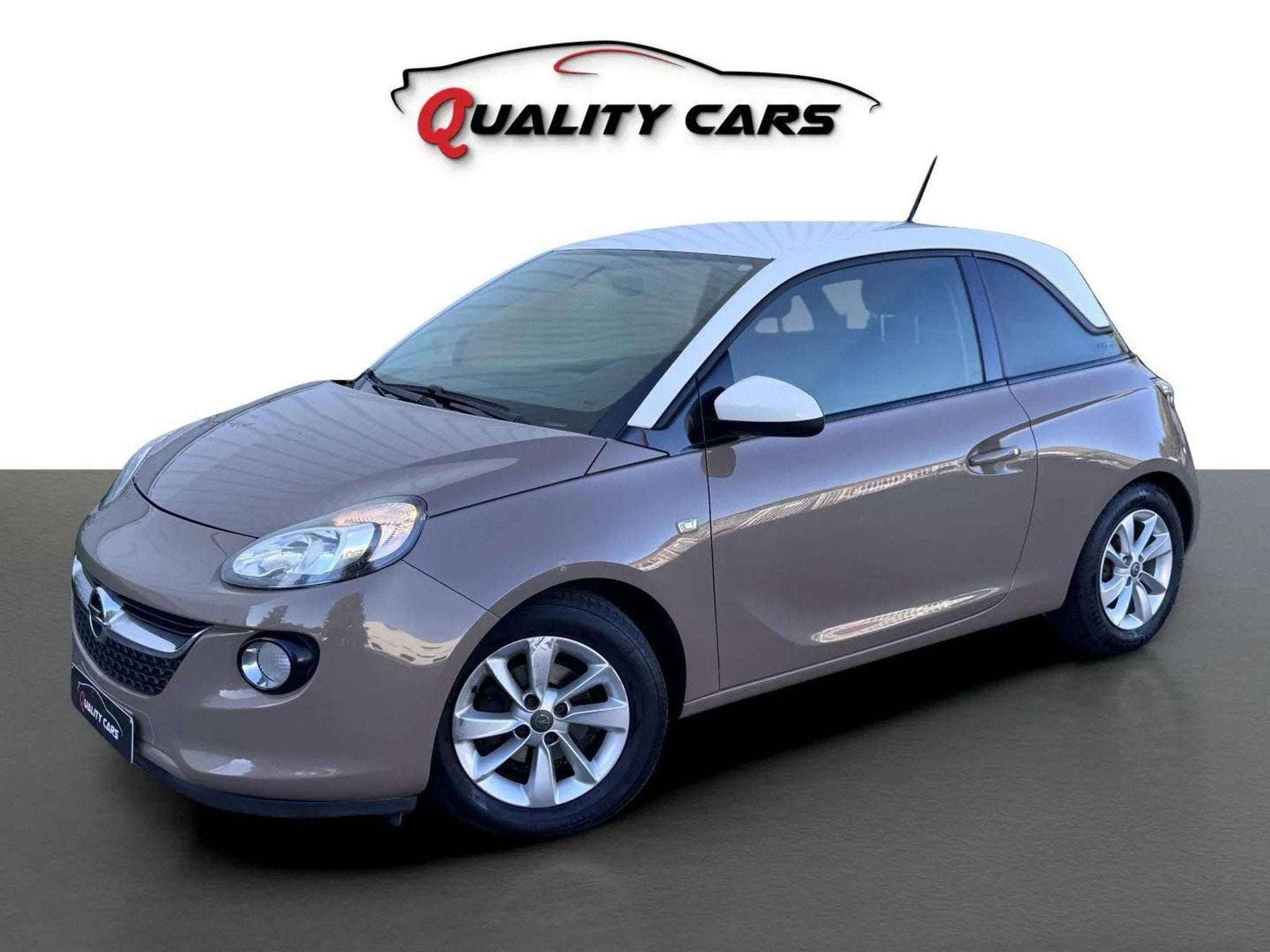 Opel Adam 1.2i | Airco | Navi | CarPlay | Garantie, Auto's, Gebruikt, Zwart, 4 cilinders, Bedrijf