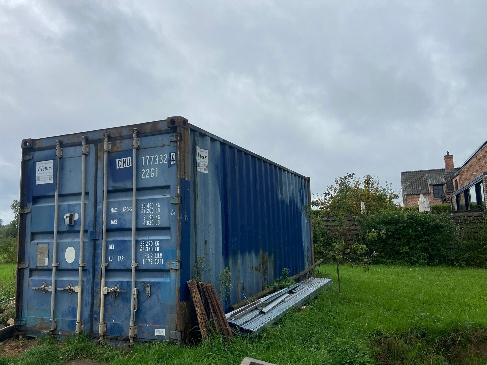 20 ft standaard occasie zeecontainer (staat in Alken), Ophalen