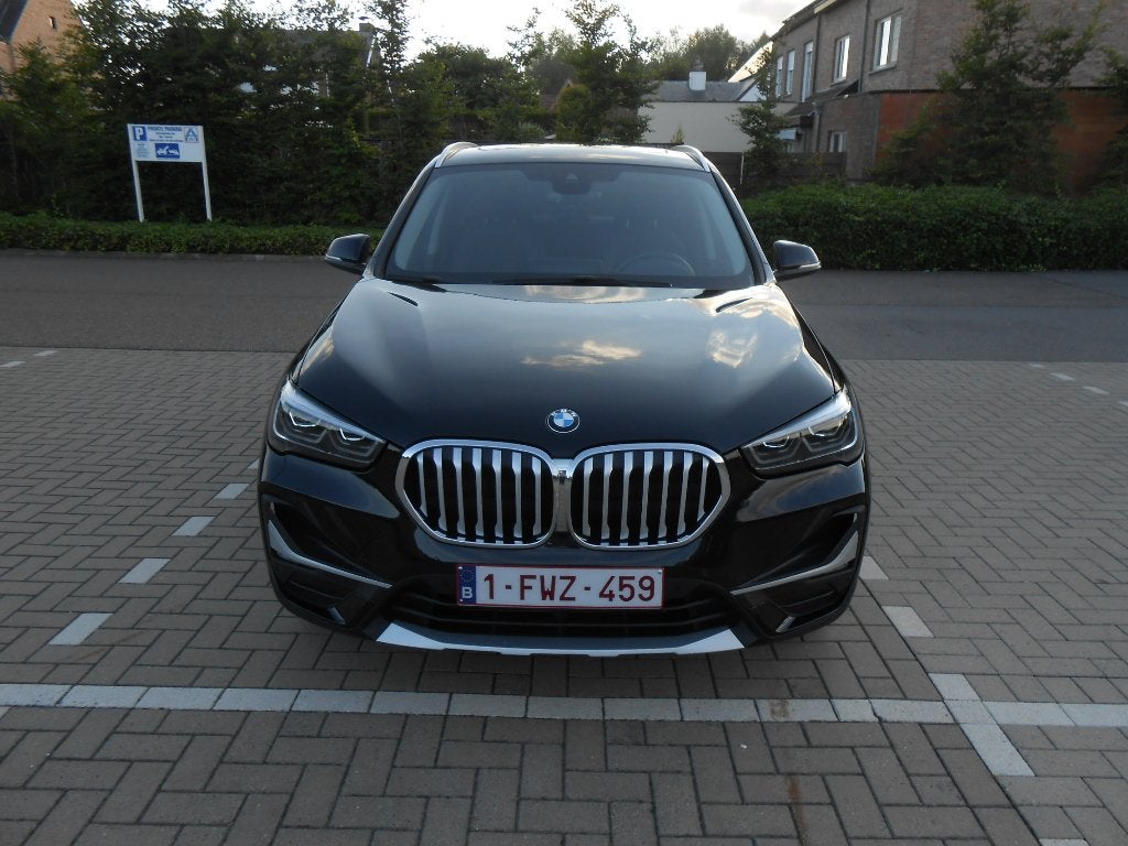 Prachtige BMW X1 sDrive 18i Xline, FULL OPTION in NIEUWSTAAT, Auto's, BMW, Dealer onderhouden, Parkeerassistent, Zwart, Leder