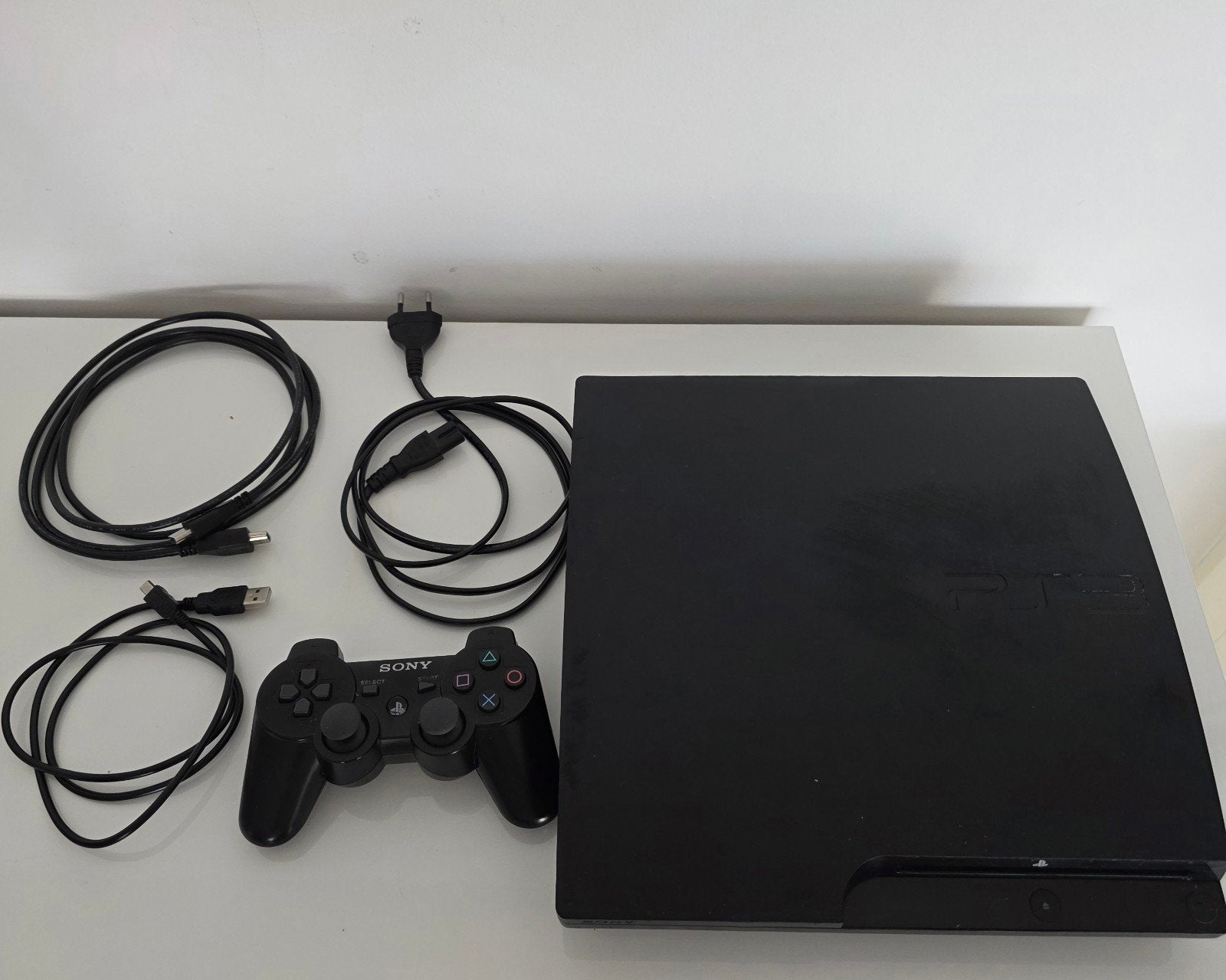 PlayStation 3 Slim 300 GB + officiële controller + kabels, Games en Spelcomputers, Spelcomputers | Sony PlayStation 3, Gebruikt