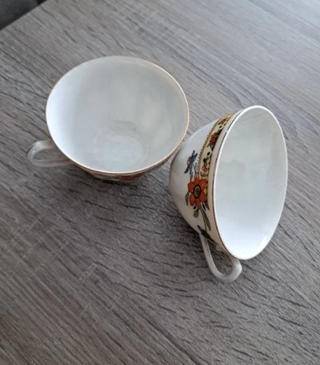 2 porseleinen tasjes, Ophalen of Verzenden, Gebruikt, Porselein, Kop en/of schotel