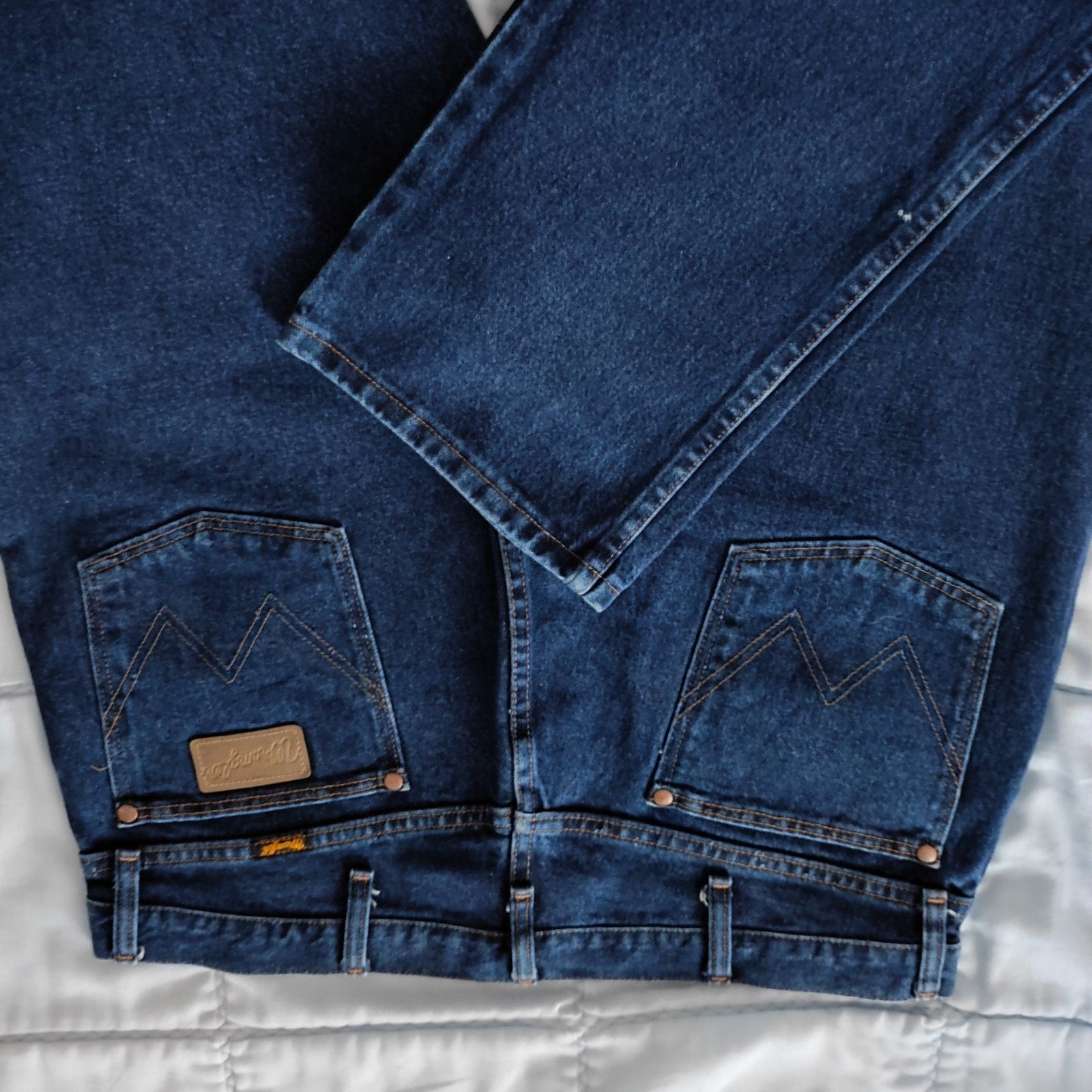 Jeans Wrangler homme, Enlèvement
