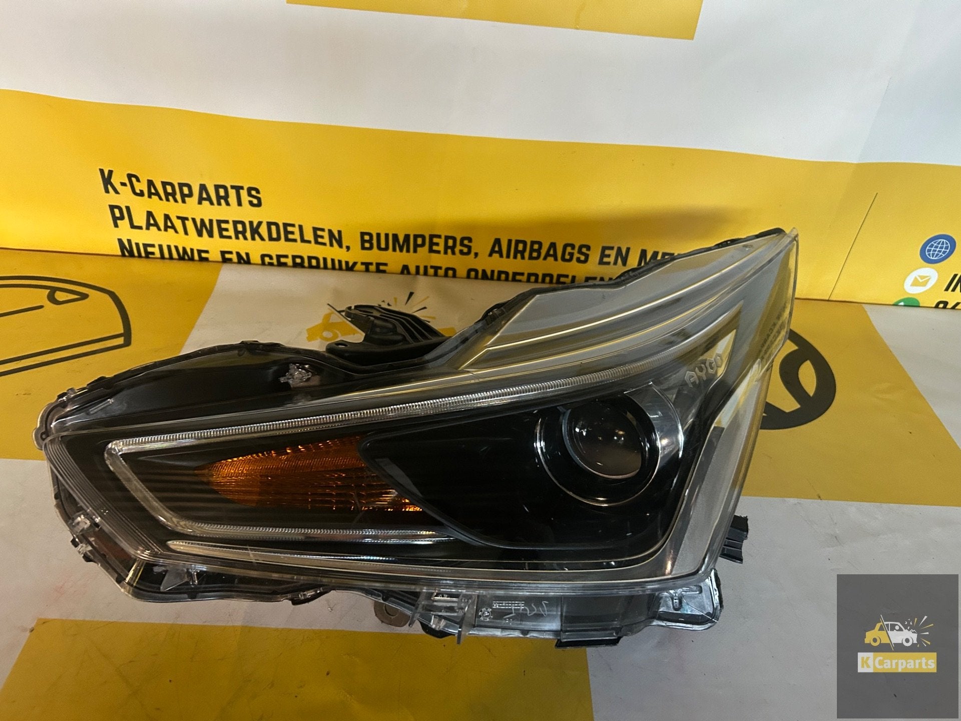 Toyota Aygo Facelift Links voor Koplamp 17-2023 origineel, Info@fabrikant.eu, Fabrikantstraat 1
1000 AA  Amsterdam, NL, Toyota